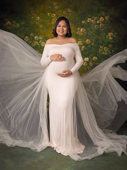 A powerful and beautiful stance. The wide, flowing train of the gown creates a dramatic and memorable effect.