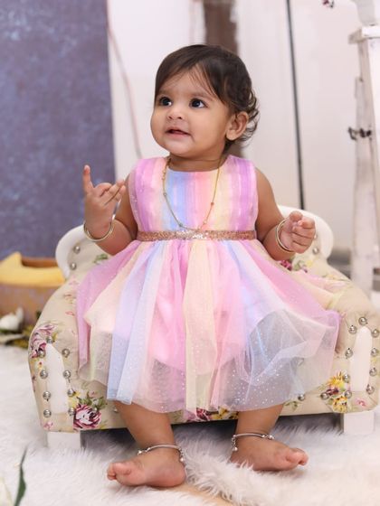 Explore our various floral and elegant setups. These sets feature props like swings, ornate chairs, and pearl decorations, all surrounded by beautiful flowers for a timeless and pretty photoshoot.