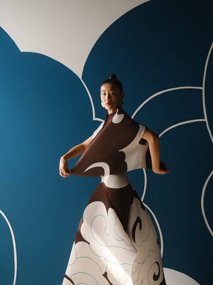 A look from the Payal Khandwala campaign featuring a cloud-like print. The styling is about creating a strong, dance-like pose that complements the graphic nature of the print and the set.