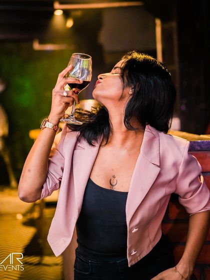 A guest enjoying a glass of wine.