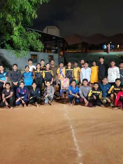 A group photo after a tough evening training session. This is our family, united by the goal of getting better every day.
