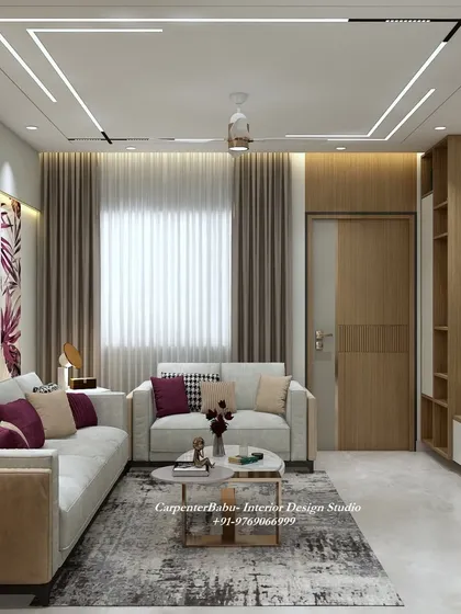 A comfortable and stylish living room with a neutral sofa, patterned cushions, and a simple, functional TV unit. The design is perfect for everyday living.