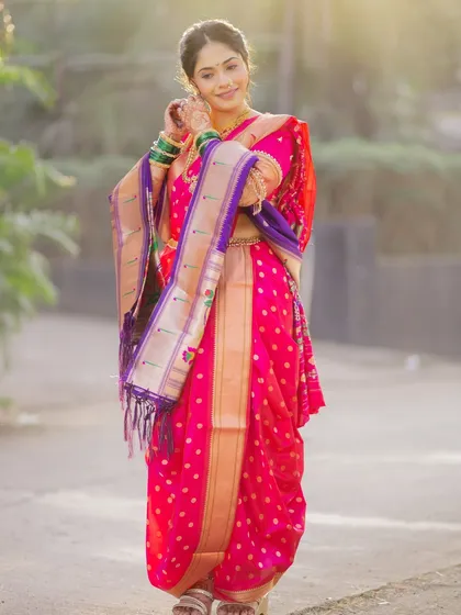 My beautiful bride glowing in her stunning pink Nauvari. I ensure the draping is not only perfect for photos but also comfortable enough to let you enjoy every moment of your big day.