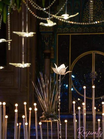A closer look at the illuminated lotus lights and crystal bird hangings, showcasing how we layer different decor elements to create a rich, detailed, and luxurious atmosphere.