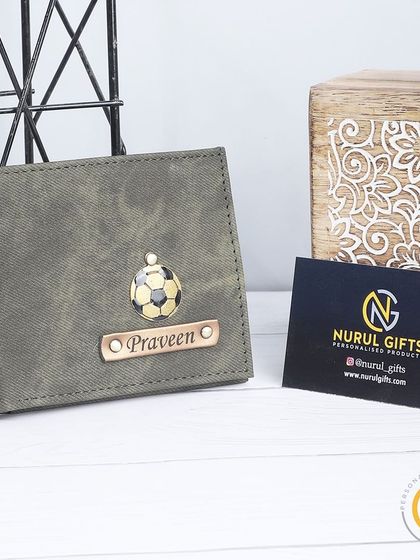 A personalized denim wallet in olive green with a football charm, perfect for a sports lover.