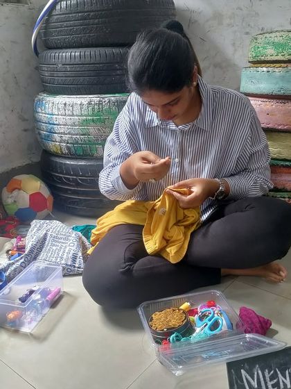 A participant at our Mumbai workshop is completely absorbed in her mending project. We provide a welcoming space where people can slow down, focus, and enjoy the satisfying process of working with their hands.