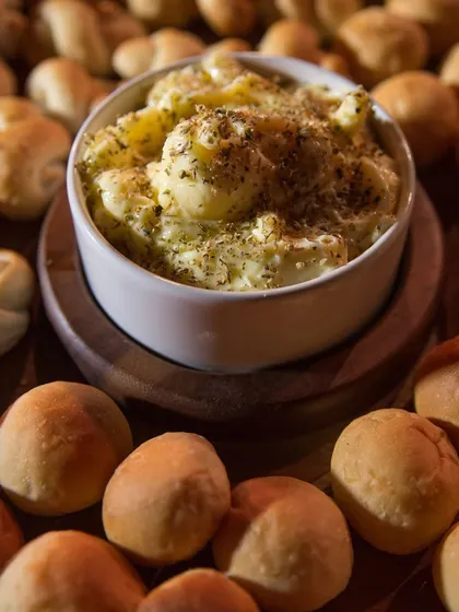 A beautiful assortment of freshly baked breads and pav, ready to accompany our main courses. We believe every element of the meal should be perfect, down to the bread.