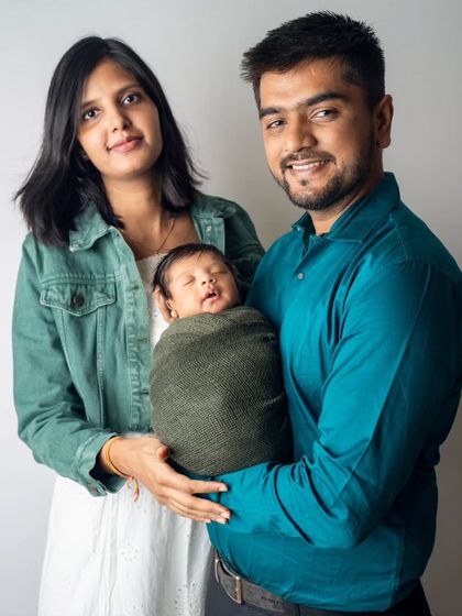 The new family of three. This is their first official portrait together, marking the beginning of a beautiful new chapter.