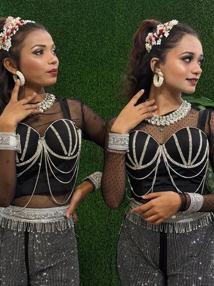 A closer look at the detailed costumes for our female dancers, featuring pearl and silver accents. Professional costumes elevate the entire performance.