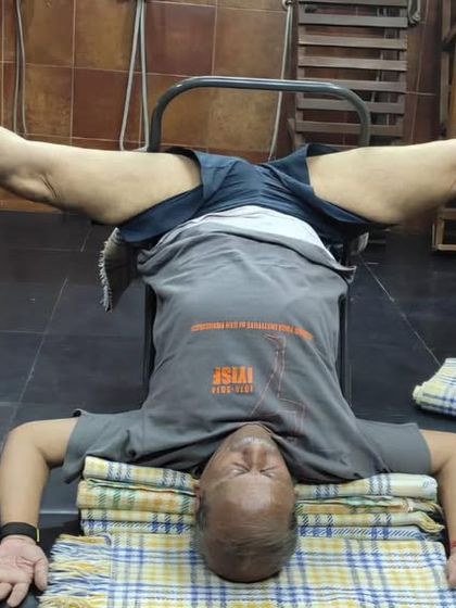 A headstand variation on a chair.