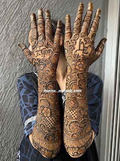 This design features the initials 'H' and 'Z' and the name 'Abdullah' in Arabic script.