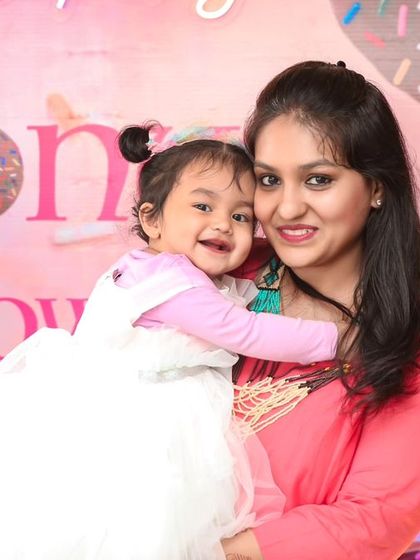 A charming 'Baby Shark' themed birthday party, featuring a vibrant underwater backdrop, character cutouts of the shark family, and blue and yellow balloons, perfect for a fun-filled celebration.