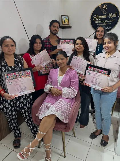 A picture of happy graduates from a recent batch. My biggest pride is seeing students complete the course with a certificate in hand, ready to start their professional journey.
