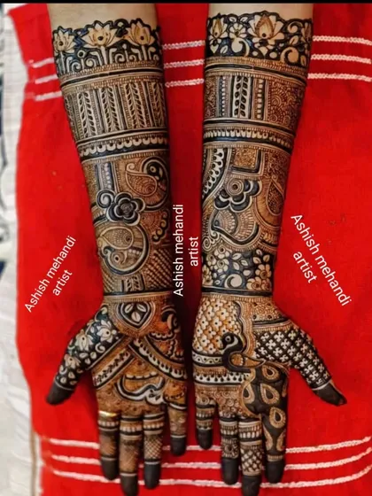 A bold and beautiful full-coverage design. The dark stain, which we guarantee, makes the intricate patterns stand out, ensuring your mehandi is a highlight of your bridal look.