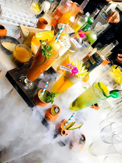 I love creating drinks that are a feast for the eyes and the palate. This is a glimpse of my signature smokey cocktails, using dry ice to create a dramatic, theatrical effect that wows guests as they receive their drinks.