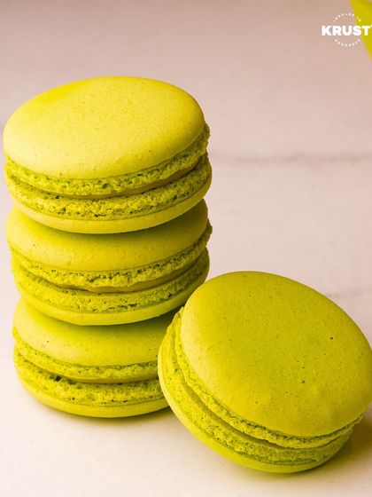 Our pistachio macarons are a fan favorite, offering a delicate, nutty flavor in a beautiful green shell.