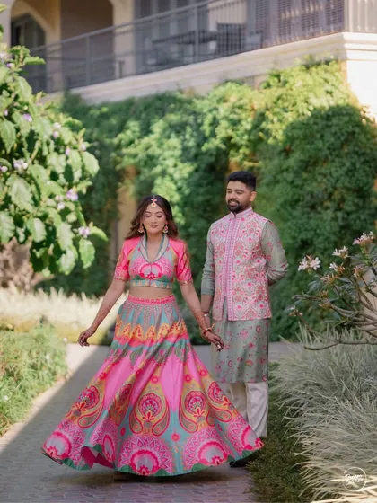 Tashi and Ratul in their vibrant, coordinated outfits for their Haldi at Sula Vineyards. The colorful attire perfectly matched the bright and sunny celebration.