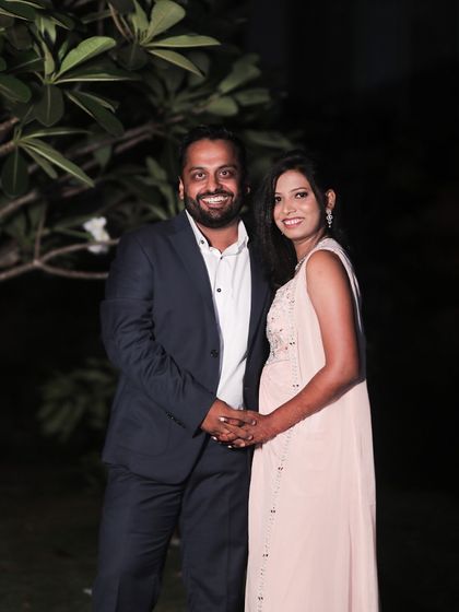 A client looking sharp in a classic deep navy suit for his engagement party. The perfect fit ensures he looks confident and feels comfortable throughout the event.