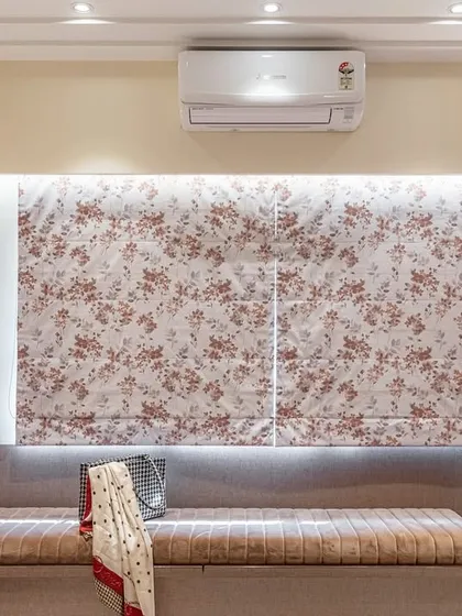 This close-up highlights the cozy window seat, complete with comfortable cushioning and backlit floral blinds. It’s a perfect example of how I create small, dedicated nooks for relaxation within a larger space.