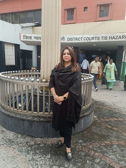 Standing outside the Tis Hazari District Courts in Delhi. My work often takes me to different jurisdictions, and I am always ready to fight for my clients wherever the case may lead.