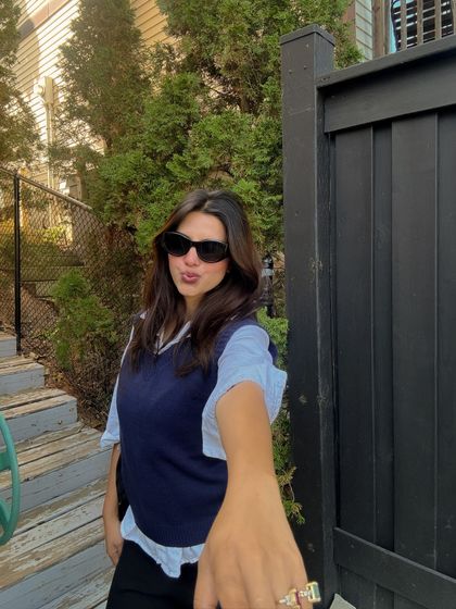 A playful, engaging shot reaching towards the camera.