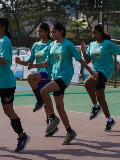 More action from our youth team's warm-up routine, showcasing their energy and synchronization.