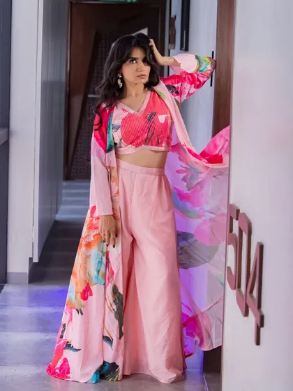 A full-length shot of the floral co-ord set, showing how the makeup and styling create a cohesive and fashionable look.