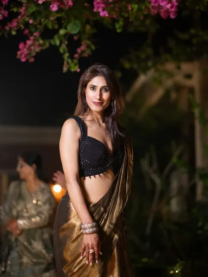 What does your ethnic style reveal about you? This photo in a beautiful gold and black saree is an example of the classic, graceful style that I love and often recommend for formal events.