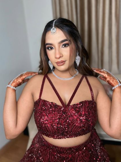 A full portrait of this engagement beauty. The makeup, hair, and outfit all come together to create a show-stopping look.