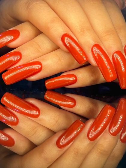 Another view of the stunning, long red nails.