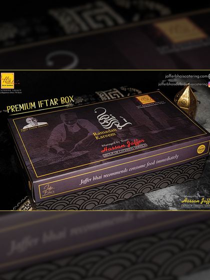 A close up of our Premium Iftar Box. The elegant design and clear branding communicate the quality and care we put into every festive order, ensuring a luxurious experience.