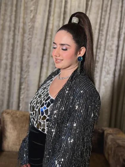 A snatched high ponytail is always a showstopper. This sleek and powerful look is perfect for a cocktail party or sangeet, giving you a chic and modern edge that lasts all night.