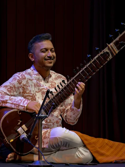The energy on stage with the Anirudh Varma Collective is electric. This photo captures a moment of shared joy during our performance at the India Habitat Centre, where traditional Indian classical music meets contemporary arrangements.