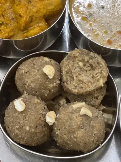 Our Churma Ladoos, made from coarsely ground wheat, ghee, and sugar, and topped with cashews.
