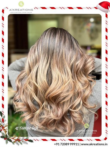 This stunning ash-blonde balayage creates a beautiful gradient effect. The soft curls at the end add volume and showcase the seamless color transition.