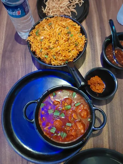 We also serve some Northeast-style Chinese dishes. Here is a meal of vegetable manchurian with fried rice, a perfect combination for a hearty lunch or dinner.