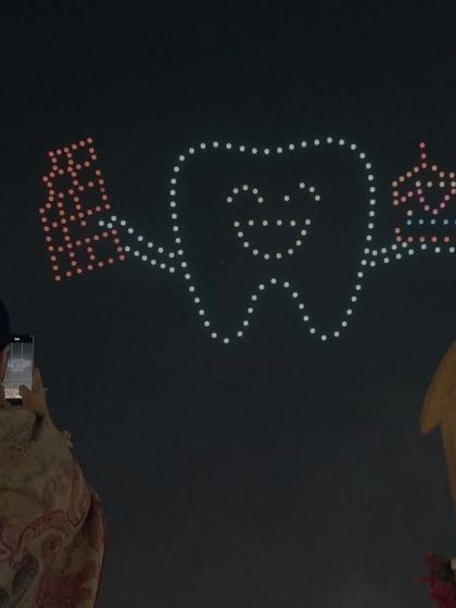 Every show is completely customizable. For this couple, both dentists, we created a smiling tooth holding a mirror and probe, a fun and quirky nod to their shared profession and love story.