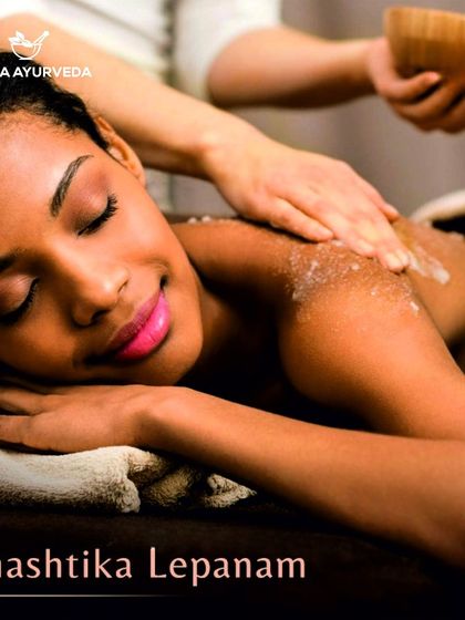 A client enjoying a Shashtika Lepanam treatment, an Ayurvedic therapy that involves applying a paste of cooked rice and herbs to exfoliate and hydrate the skin.