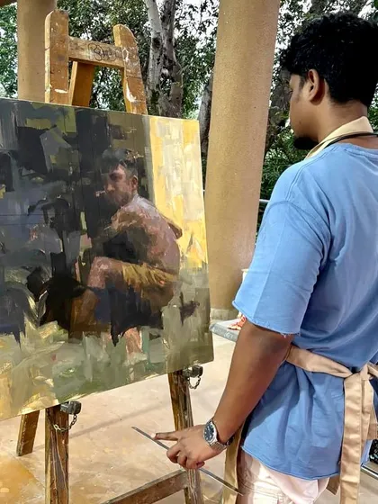 Here I am with the finished painting "HOPE II" at a monsoon art camp in Lonavla. The piece, showing a young boy with his pigeons, is a meditation on childhood, nature, and hope.