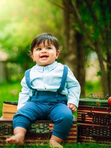 A happy moment from our outdoor traveler session, showcasing the beautiful natural light and fun props.