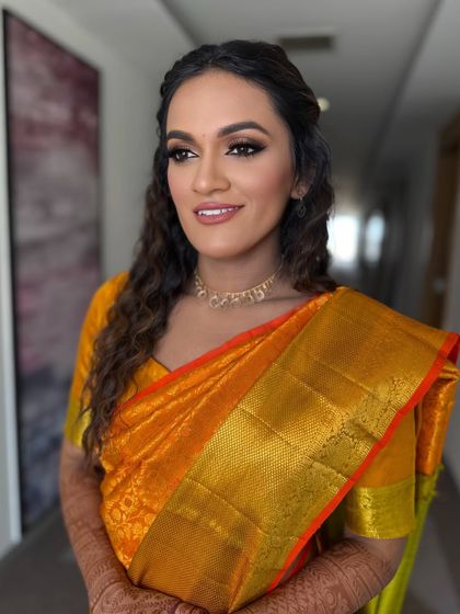 Her skin looks absolutely flawless and radiant. We believe in a skin-first approach, ensuring the base is perfect before adding any color.