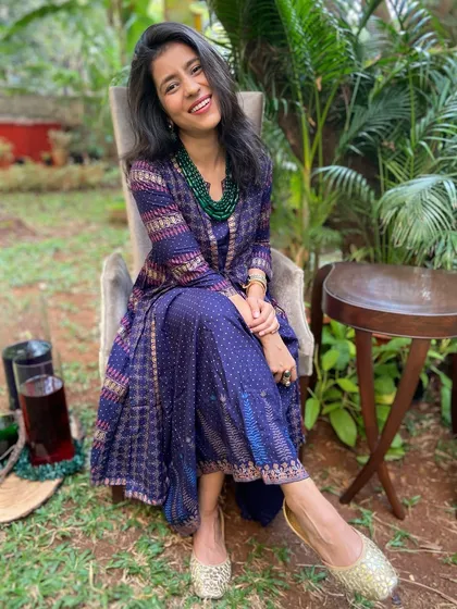 My look for a relaxed outdoor event. This printed blue jacket and pants set paired with traditional juttis is comfortable yet stylish, perfect for a festive daytime gathering.