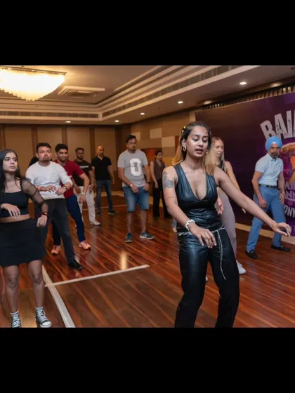 Teaching a footwork and styling workshop. My diverse background in dance allows me to bring unique perspectives to my Latin dance classes.