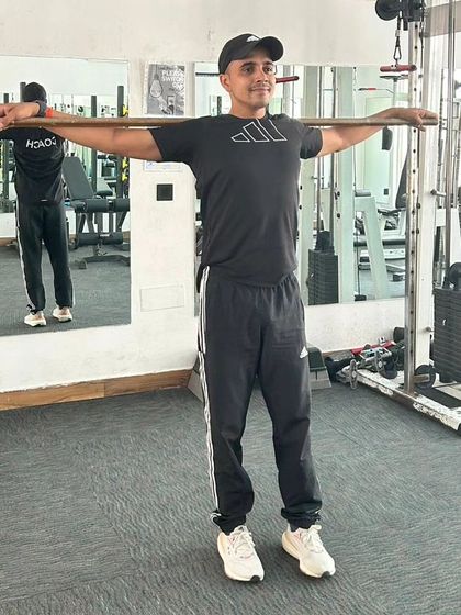 Standing tall after a mobility exercise. Good posture is a sign of a strong core.