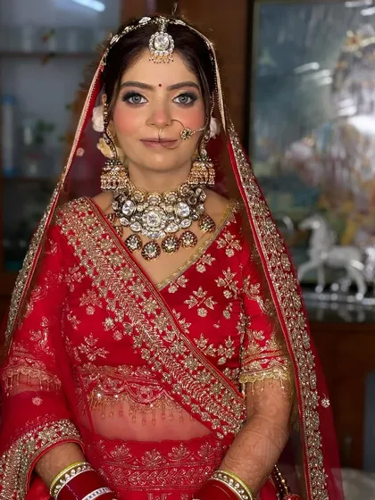 A close-up showcasing the detailed eye makeup and flawless skin. The blue undertones in her eyes are beautifully highlighted with this look.