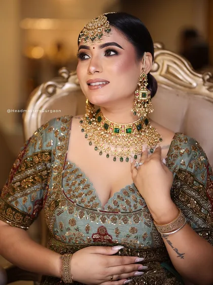 A candid-style shot from our editorial shoot, showing the bride's glowing makeup and beautiful smile. This highlights how our looks appear natural and radiant.