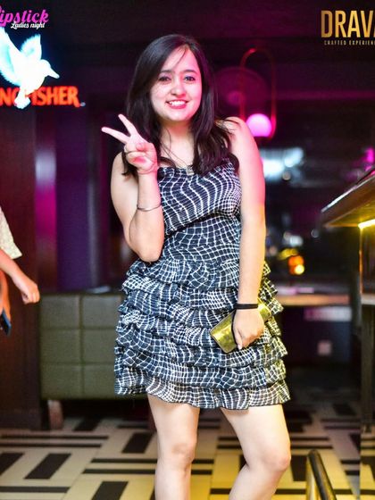 A guest enjoying the party at Drava. The club's vibrant decor makes for great photos.
