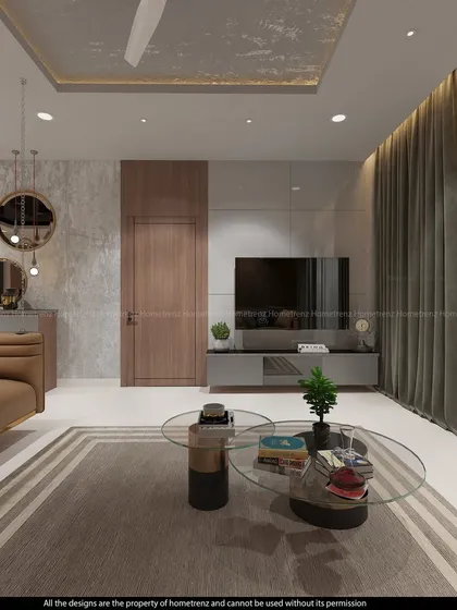 This angle shows the TV unit and accent wall with circular mirrors. The design plays with reflections and textures to make the space feel larger and more dynamic.