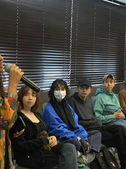 Leading a vocal session with an engaged group of learners. My goal is to create a comfortable space where everyone feels they can participate, listen, and contribute to the music we're making.