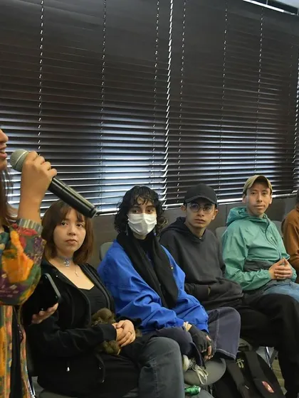 Leading a vocal session with an engaged group of learners. My goal is to create a comfortable space where everyone feels they can participate, listen, and contribute to the music we're making.